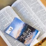 opened brown hardbound cover bible book