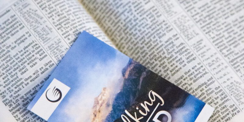 opened brown hardbound cover bible book