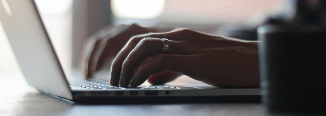 person using laptop